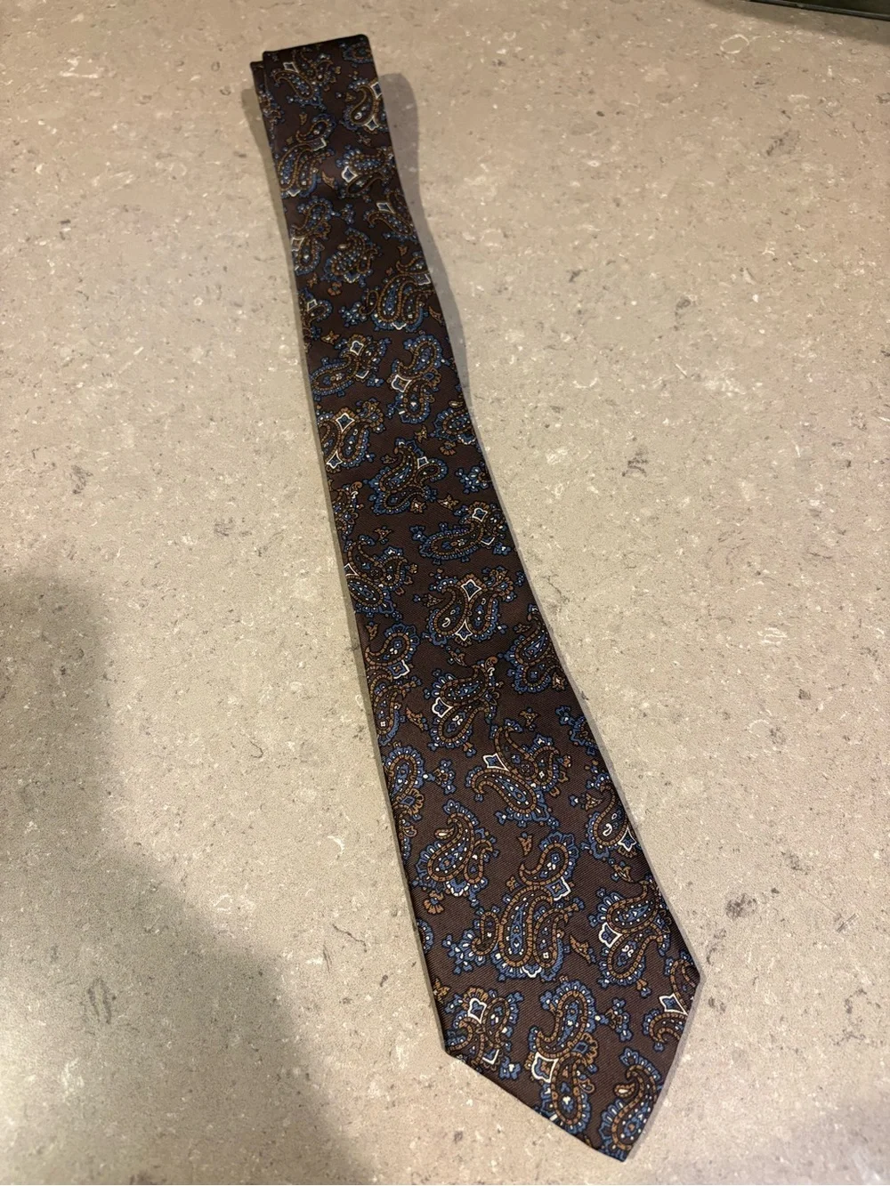 Don Loper 100% Silk rich brown background with blue and gold paisley detailing.